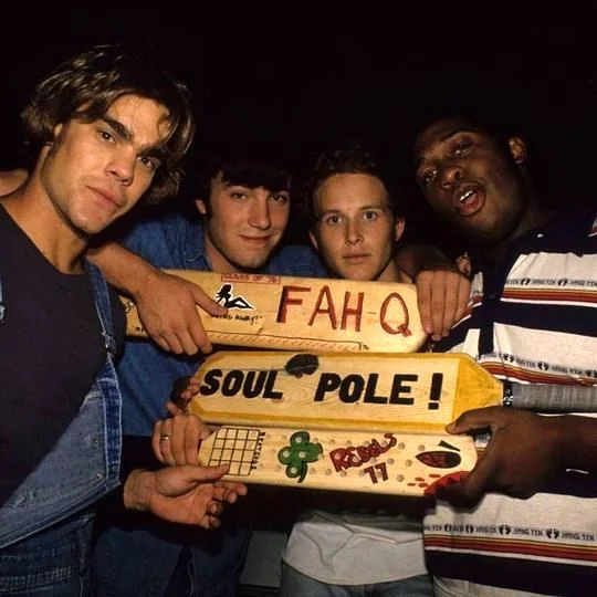 a group of men holding signs