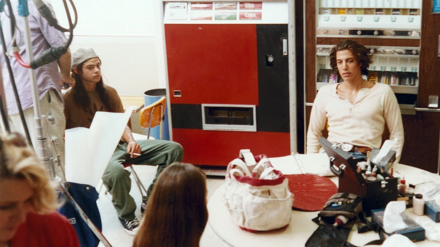 a group of people sitting around a table