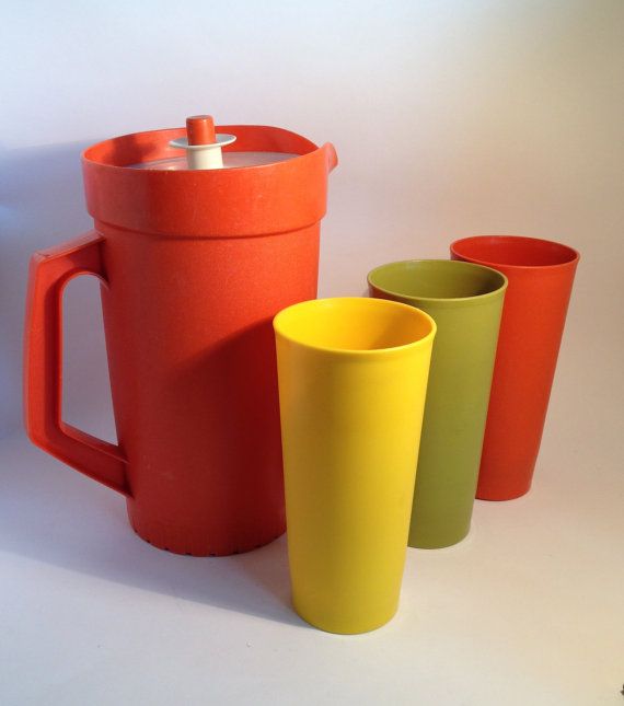 Vintage tupperware cups and pitcher in various colors 