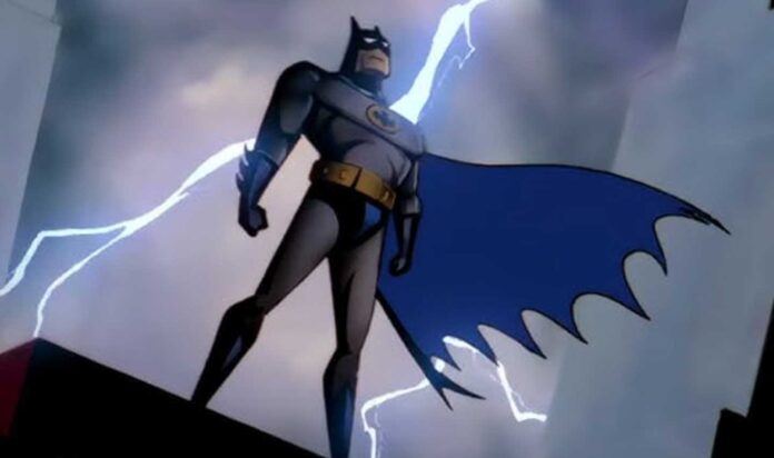 Still of Batman from the Batman Animated Series standing on a rooftop with lightning striking behind him