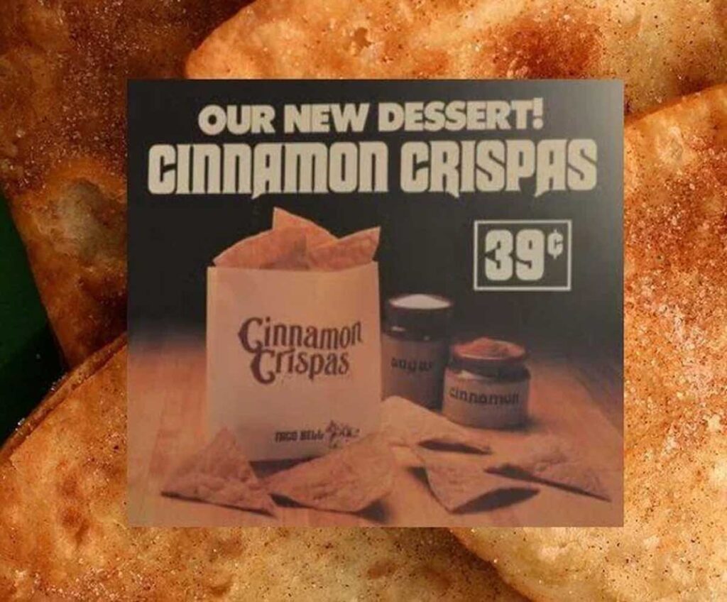 A vintage advertisement for Cinnamon Crispas, one of the beloved discontinued Taco Bell menu items, shows a bag and a tray with crispas and dipping sauces. The text reads Our new dessert! Cinnamon Crispas for 39 cents, set against cinnamon-sugar-covered treats.