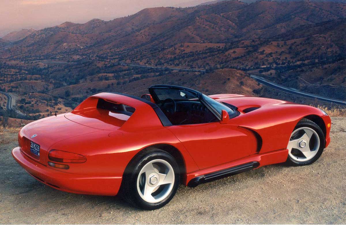 Red Dodge Viper RT/10 Prototype (1991) on a cliff