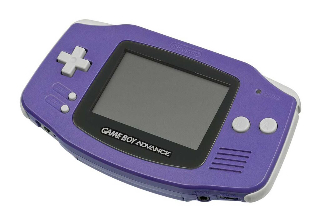 A purple handheld gaming device with a screen in the center, directional pad on the left, and buttons on the right. The text Game Boy Advance is below the screen, marking it as one of the best-selling video game consoles.