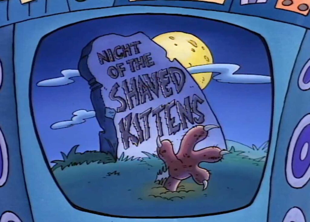 An illustration of a spooky movie scene titled Night of the Shaved Kittens. It features a gravestone with the title and a full moon in the background. A furry paw emerges from the ground, adding to the eerie atmosphere.