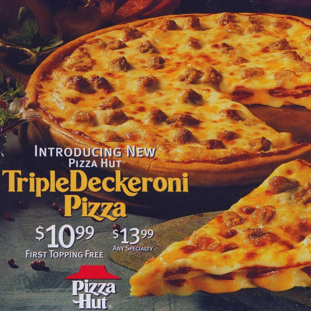 Savor the nostalgia with Pizza Hut's Triple Deckeroni Pizza, reminiscent of beloved discontinued fast food items! Enjoy layers of pepperoni and cheese—just $10.99 for the first topping free or $13.99 for any specialty. Grab a slice before it’s history!