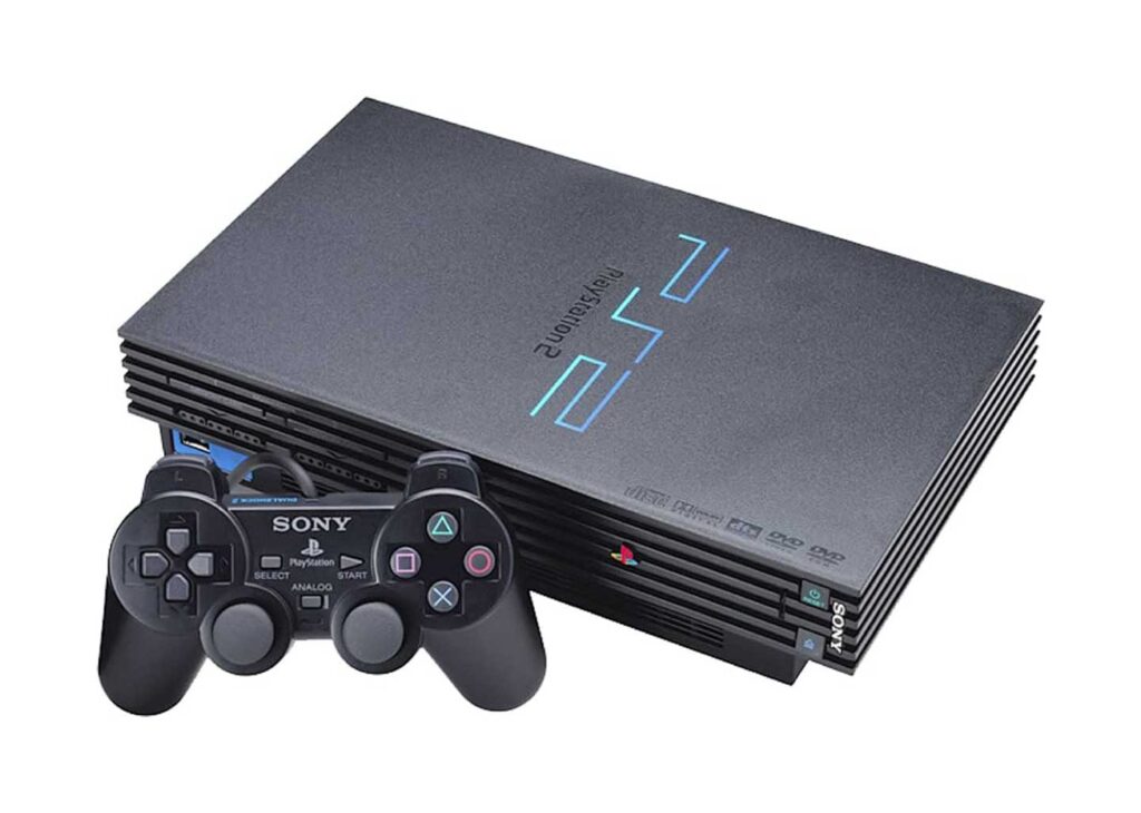 A black PlayStation 2 console with its matching DualShock 2 controller. As one of the best-selling video game consoles, it features a sleek, rectangular design with a blue and black logo on top and multiple horizontal grooves along the front edge.