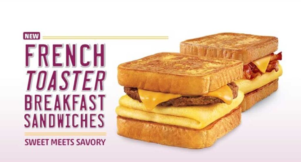 Image of two French Toaster breakfast sandwiches featuring layers of toast, egg, cheese, and sausage or bacon. Text reads, New French Toaster Breakfast Sandwiches - Sweet Meets Savory. Rediscover the charm of discontinued fast food items with this delightful creation.