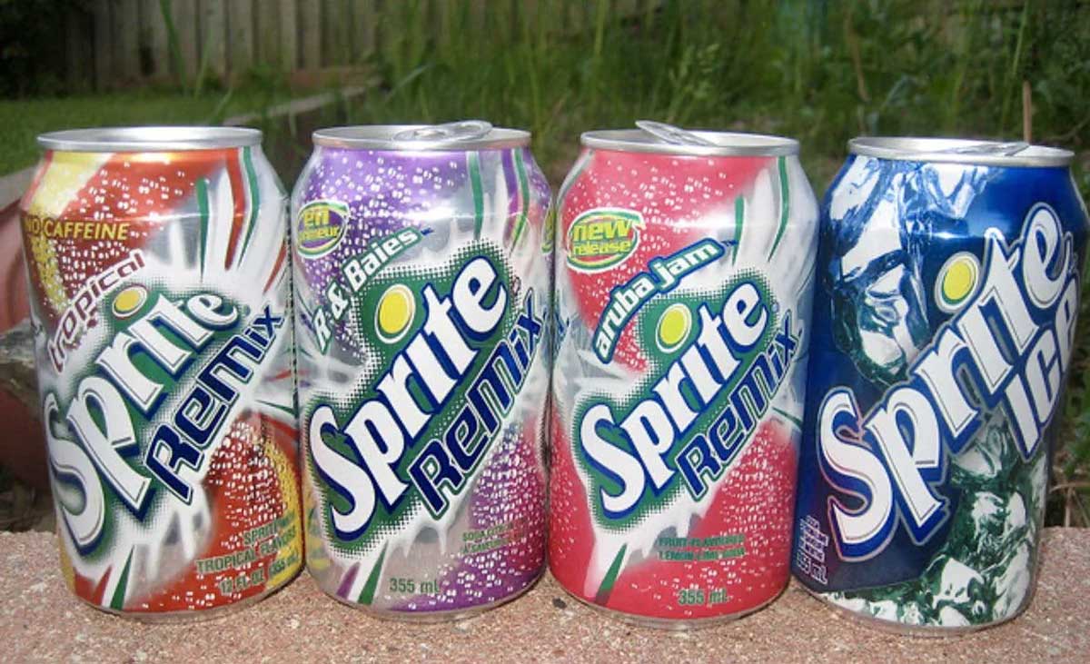 Four cans of four different flavors of Sprite Remix