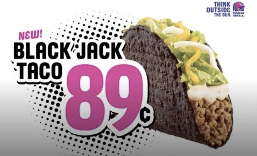 Introducing the new Black Jack Taco for just 89¢! Dive into a flavor fiesta with juicy beef, crisp lettuce, onions, and melty cheese. A trend-setting twist reminiscent of beloved but discontinued fast food items. Taco Bell logo and Think Outside the Bun slogan feature prominently in the top right corner.