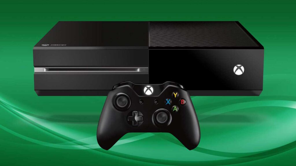 An Xbox, one of the best-selling video game consoles, is displayed with a sleek black controller in front on a vibrant green background.