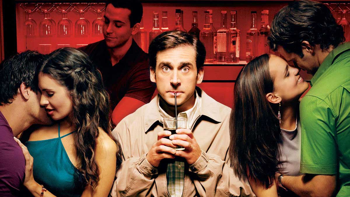 Steve Carell sipping from a glass in a promo image for 40-year-old Virgin