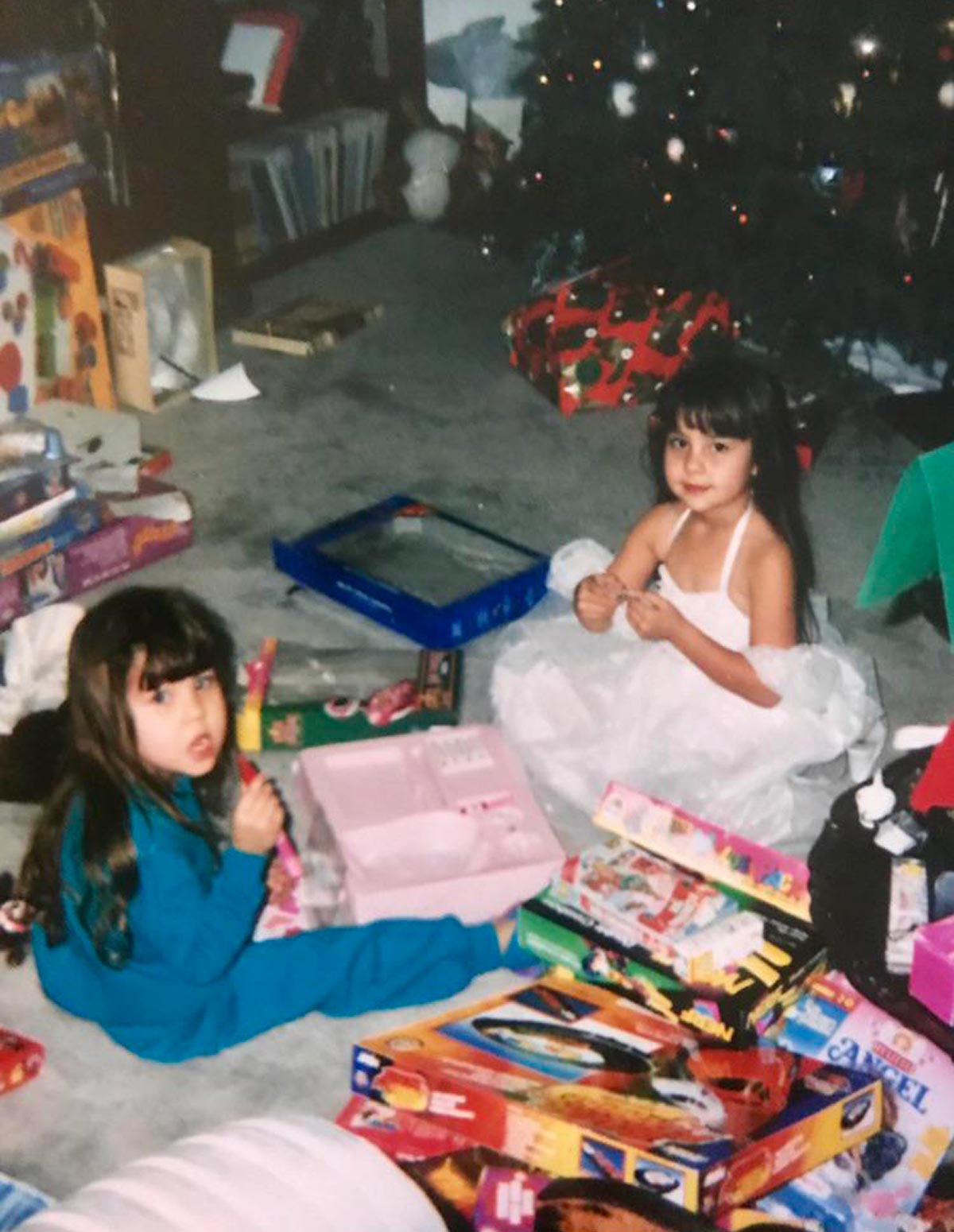 Two girls on Christmas morning in 1993 