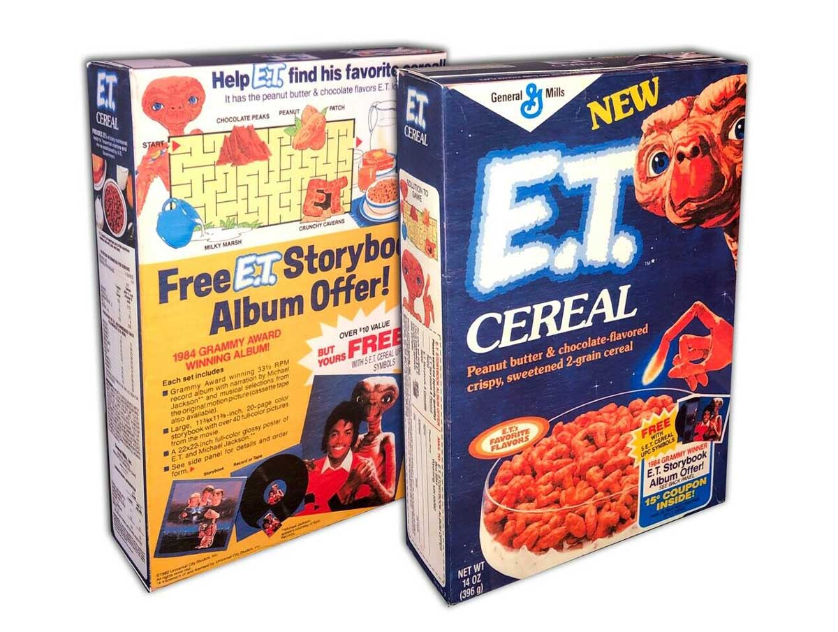 Front and back of a box of E.T. Cereal from General Mills. The back highlights a free storybook album offer, while the front showcases a bowl of peanut butter and chocolate-flavored cereal.