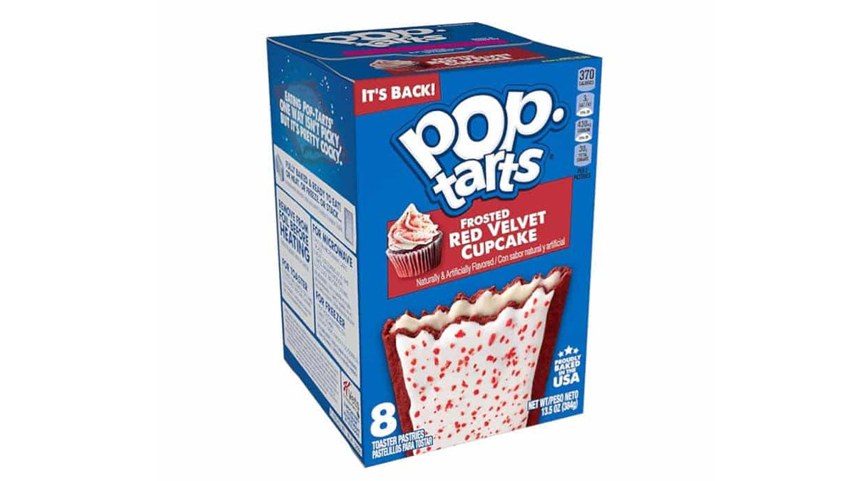 Box of Pop-Tarts featuring the Frosted Red Velvet Cupcake flavor. The packaging is blue with red and white accents, showcasing an image of a Pop-Tart with red sprinkles and a cupcake illustration on the side.