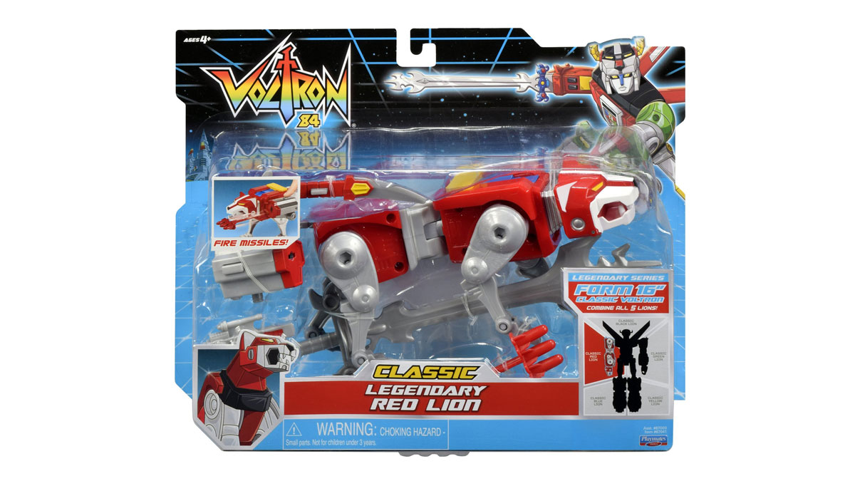 Packaging for a Voltron Classic Legendary Red Lion toy. It features a red mechanical lion figure with silver legs and highlights. The packaging shows the Voltron logo and a diagram indicating that it combines to form a larger robot.