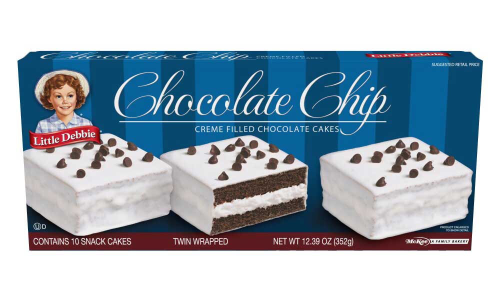 The image shows a box of Little Debbie Chocolate Chip Creme Filled Chocolate Cakes. The packaging features three images of the snack cakes, each with white creme filling and dotted with chocolate chips. Contains 10 twin-wrapped cakes, net weight 12.39 oz.