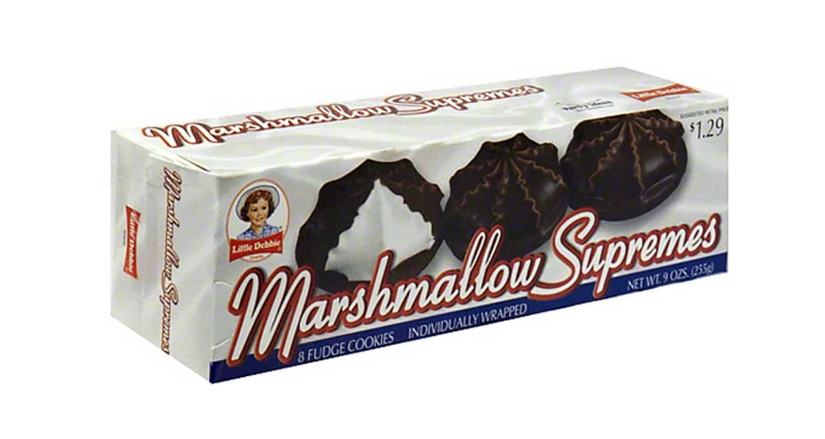 A box of Little Debbie Marshmallow Supremes, featuring an image of fudge cookies with marshmallow centers. The packaging is white with red and blue text, showing a price of $1.29.