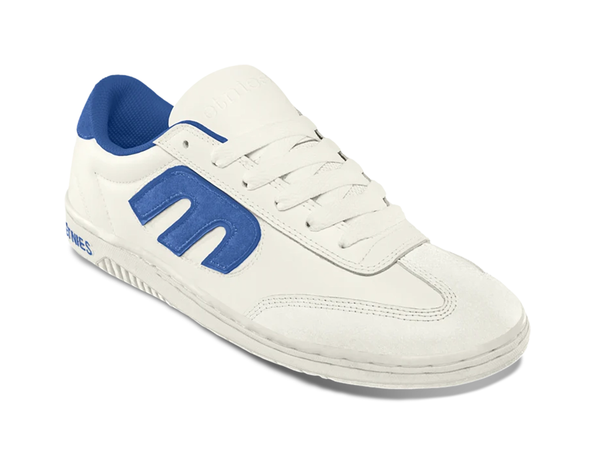 A white sneaker with a blue E logo on the side, blue heel collar, and white laces. The sole is white with textured grip and the brand name appears subtly on the tongue and heel.