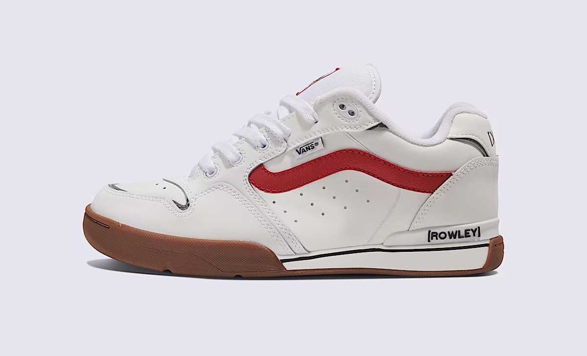 A white low-top Vans sneaker with a red side stripe, gum rubber sole, and black ROWLEY branding near the heel, viewed from the side against a plain background.