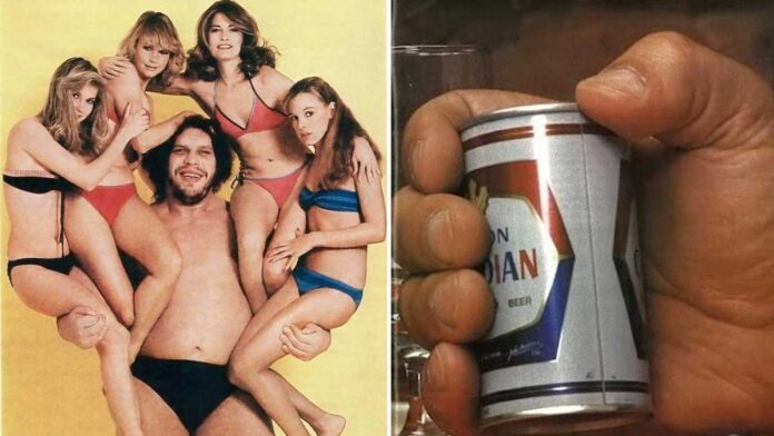 A large man in swim trunks poses with five women in bikinis on the left; on the right, an oversized hand holds a small beer can, making the can look tiny by comparison.