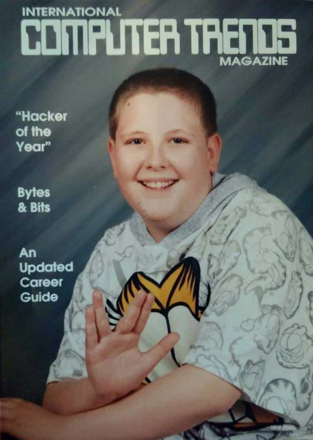 A smiling boy wearing a patterned hoodie and giving a Vulcan salute poses for a mock magazine cover titled International Computer Trends Magazine, with headlines like Hacker of the Year and An Updated Career Guide.