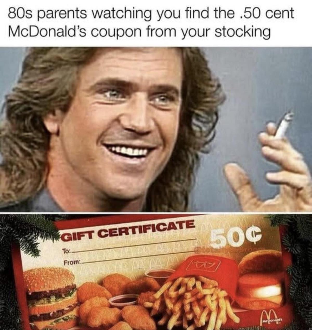 Mel Gibson in the 80s smiling and holding a cigarette is above a vintage McDonald’s 50-cent gift certificate, fries, nuggets, and burgers. Text jokes about parents giving this coupon in holiday stockings.