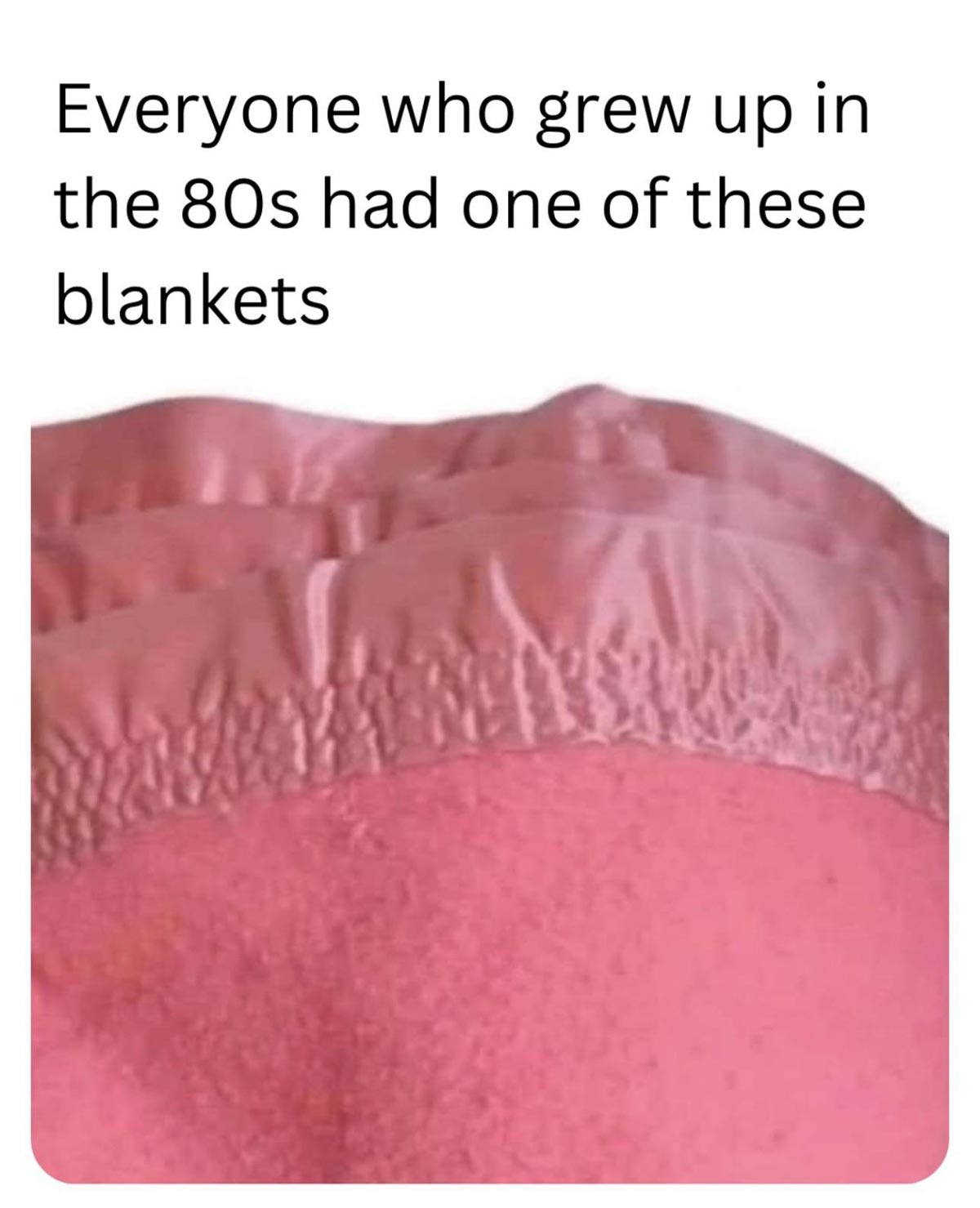 A close-up of a pink blanket with a shiny satin trim, accompanied by text: Everyone who grew up in the 80s had one of these blankets.