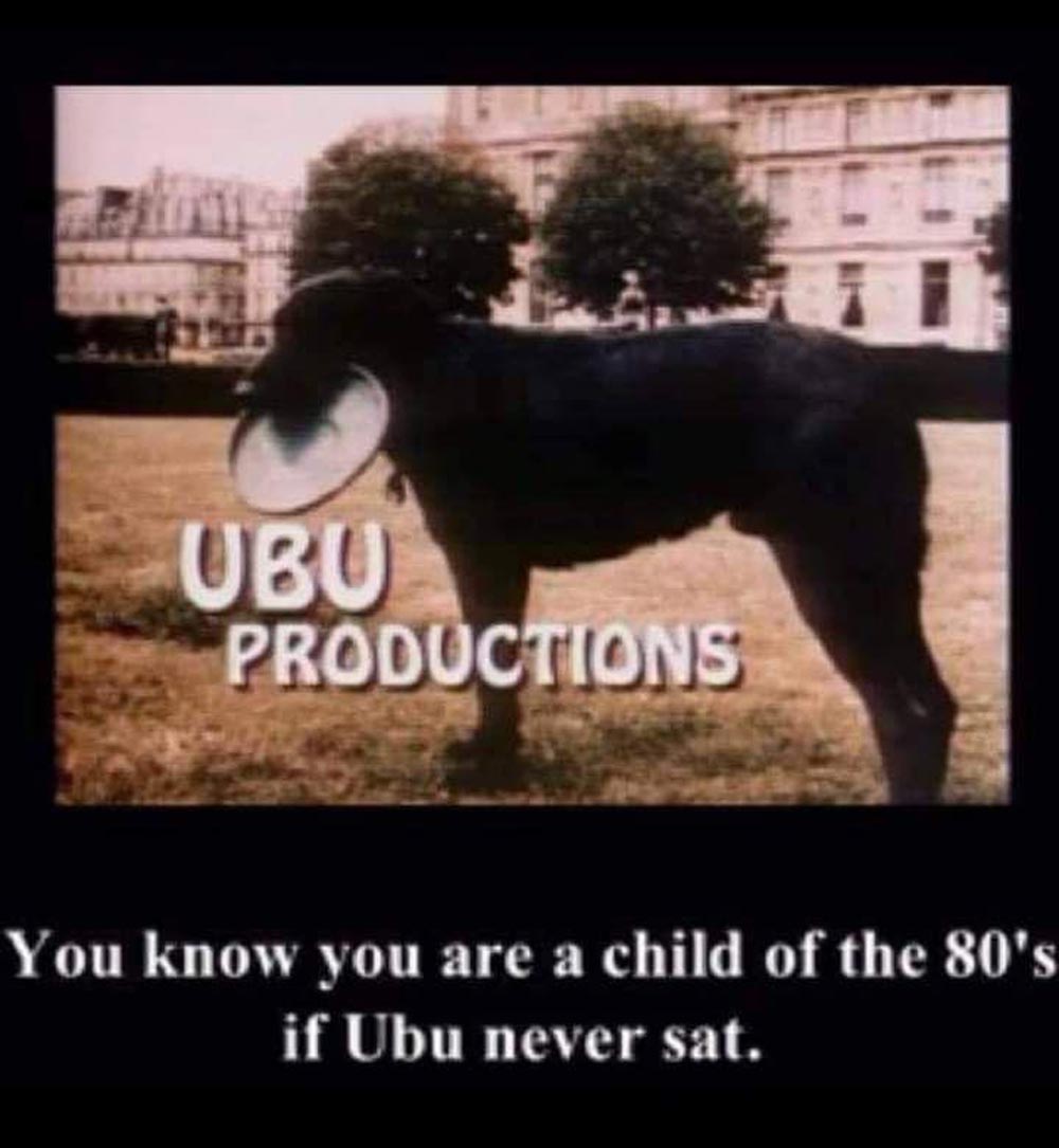 A black dog with a frisbee in its mouth stands on grass with UBU PRODUCTIONS text over it. Below, it says, You know you are a child of the 80s if Ubu never sat.